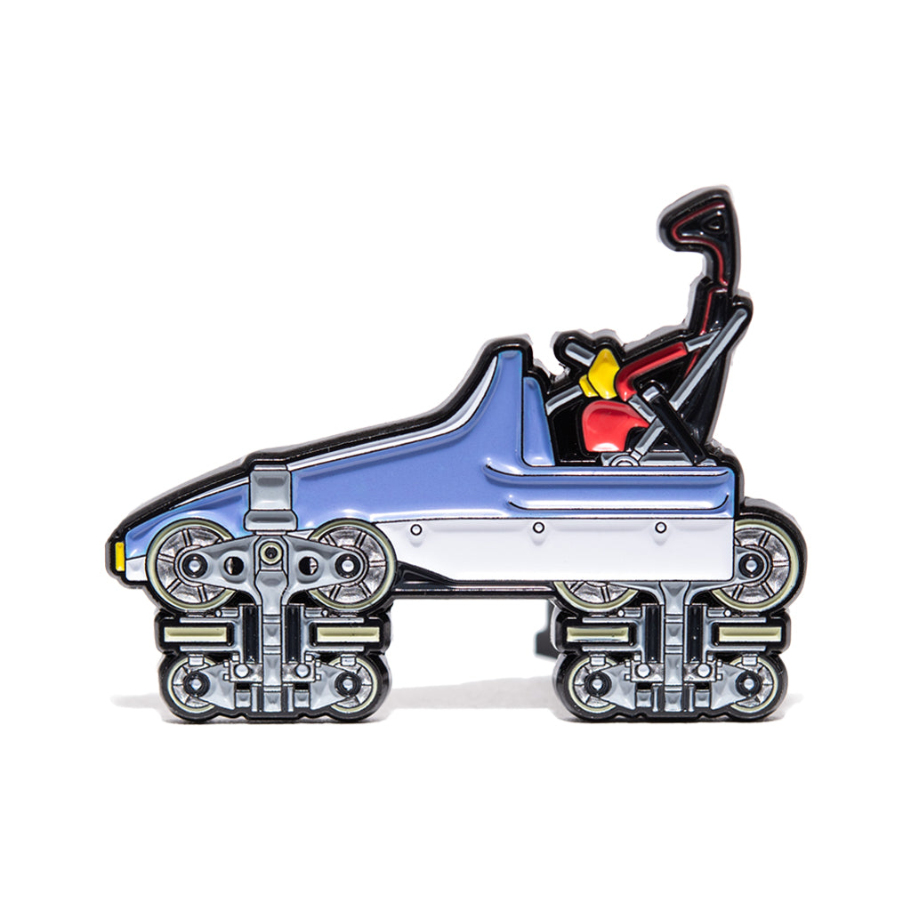 Side profile of Top Thrill Dragster's front cart in enamel pin form, on white background.

